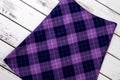 Close up top view checkered violet skirt.