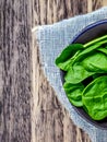 close up top view fresh spinach on table, healthy food concept