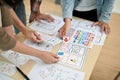 A close-up top view image of a group of developers is in the meeting Royalty Free Stock Photo