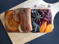 Close-up top view loaf of fruitcakes St-Germain elderflower liqueur seasons cake with Merry Christmas