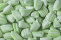 Close up top view of a pile of green and white striped mint candy Royalty Free Stock Photo