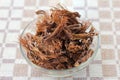 Close up and top view red cotton tree flowers dried in the glass bowl Royalty Free Stock Photo