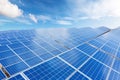 Close up top view of Solar energy panels with blue sky with couds background. Clean and renewable energy concept for a