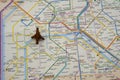 Close up top view of toy Eiffel tower on colorful Paris subway map showing metro lines, stations Royalty Free Stock Photo