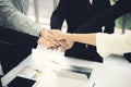 Close up top view of young business people putting their hands together. Stack of hands. Unity and teamwork concept Royalty Free Stock Photo