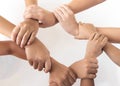 Close up top view of young people putting their hands together. Friends with stack of hands showing unity and teamwork. Royalty Free Stock Photo