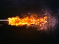 A close up of a torch with fire coming out of it Royalty Free Stock Photo