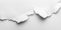 A close-up of torn white paper creating a textured background Royalty Free Stock Photo