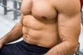 Close-up torso of male athlete at gym Royalty Free Stock Photo