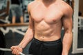 Close up torso of male athlete at gym Royalty Free Stock Photo