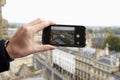 Close Up Of Tourist Taking Photo Of Oxford Skyline Using Phone Royalty Free Stock Photo