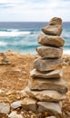 Close up of tower of stones at coast