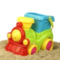 Close-up Of Toy Train With Sand Heap Isolated