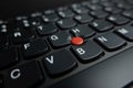 Trackpoint pointing device on Lenovo Thinkpad notebook computer Royalty Free Stock Photo