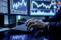 Professional trader typing on a sleek keyboard with dynamic financial charts