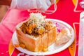 Close up of Traditional African bread based street food called Bunny Chow at outdoor festival Royalty Free Stock Photo