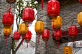 Close-up of traditional blessing lanterns in ancient Chinese architecture. Translation: Happy New Year. Royalty Free Stock Photo