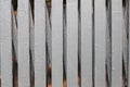 Close up traditional folding grey metal door gate. Texture, Background.