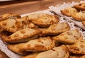 Close up of traditional fried Spanish and Argentine empanadas at a street food market in spain