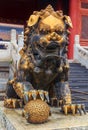 Traditional guilded male Imperial guardian lion with the symbol