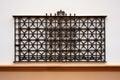 close-up of traditional spanish iron grillwork against stucco walls Royalty Free Stock Photo
