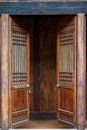 Close-up of traditional wooden door in ancient Chinese building Royalty Free Stock Photo