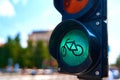 Close-up of a traffic light for cyclists, which is glowing green. A bicycle is shown on the traffic light Royalty Free Stock Photo