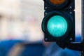 Close-up of traffic semaphore with green light on defocused city street background with copy space Royalty Free Stock Photo