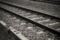 Close-up train rail track in a black and white picture Royalty Free Stock Photo