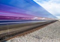 Close up of train speeding through English countryside with motion blur Royalty Free Stock Photo