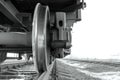 Close-up of a train wheel. Black and white photo with grainy effec Royalty Free Stock Photo