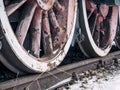 Close up with train wheels on track. Wheels of a train on the railway tracks Royalty Free Stock Photo