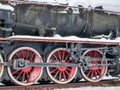 Close up with train wheels on track. Wheels of a train on the railway tracks Royalty Free Stock Photo