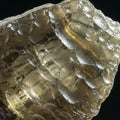 Close-up of a translucent, glass-like material featuring a rough, irregular surface with Royalty Free Stock Photo