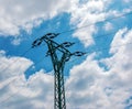 Close-up transmission towers (power tower, electricity pylon) cloud blue sky. Royalty Free Stock Photo