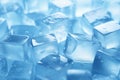 Close up of transparent ice cubes for drinks and cooling wet with water drops on blue background top view. Generative AI Royalty Free Stock Photo