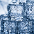 A close-up of transparent ice cubes, featuring smooth surfaces and numerous small Royalty Free Stock Photo