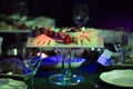 Close up of a tray of assorted rustic bread and cheese with olives and grapes. Royalty Free Stock Photo