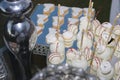 Close up of tray with lot delicious diversity pastry cakes tattlers and macaroon in a row Royalty Free Stock Photo