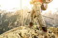 Close up of trekking hiker legs and boots on french alps Royalty Free Stock Photo