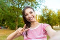 Close-up of trendy girl face is making selfie photo Royalty Free Stock Photo