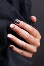 Close-up of trendy spotted nails