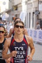 Close-up of triathlete Sarah True running, followed competitors