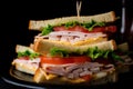 Close-up of a Triple Decker Club Sandwich Filled with Turkey, Ham, Cheese, and Tomatoes, Perfectly Stacked