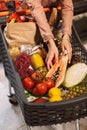 Close up trolley full of fresh products in modern supermarket isolated