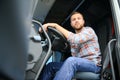 Close up of truck driver behind steering wheel. Copy space. Royalty Free Stock Photo