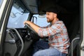 Close up of truck driver behind steering wheel. Copy space. Royalty Free Stock Photo