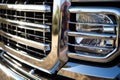 close up of a trucks big shiny chrome grill Royalty Free Stock Photo