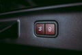 Close-up of the trunk release button. modern car interior. Royalty Free Stock Photo