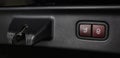 Close-up of the trunk release button. modern car interior. Royalty Free Stock Photo